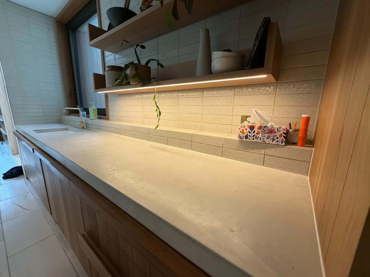 Caulked joint on a concrete benchtop and splashback, Toorak, by TN Stone