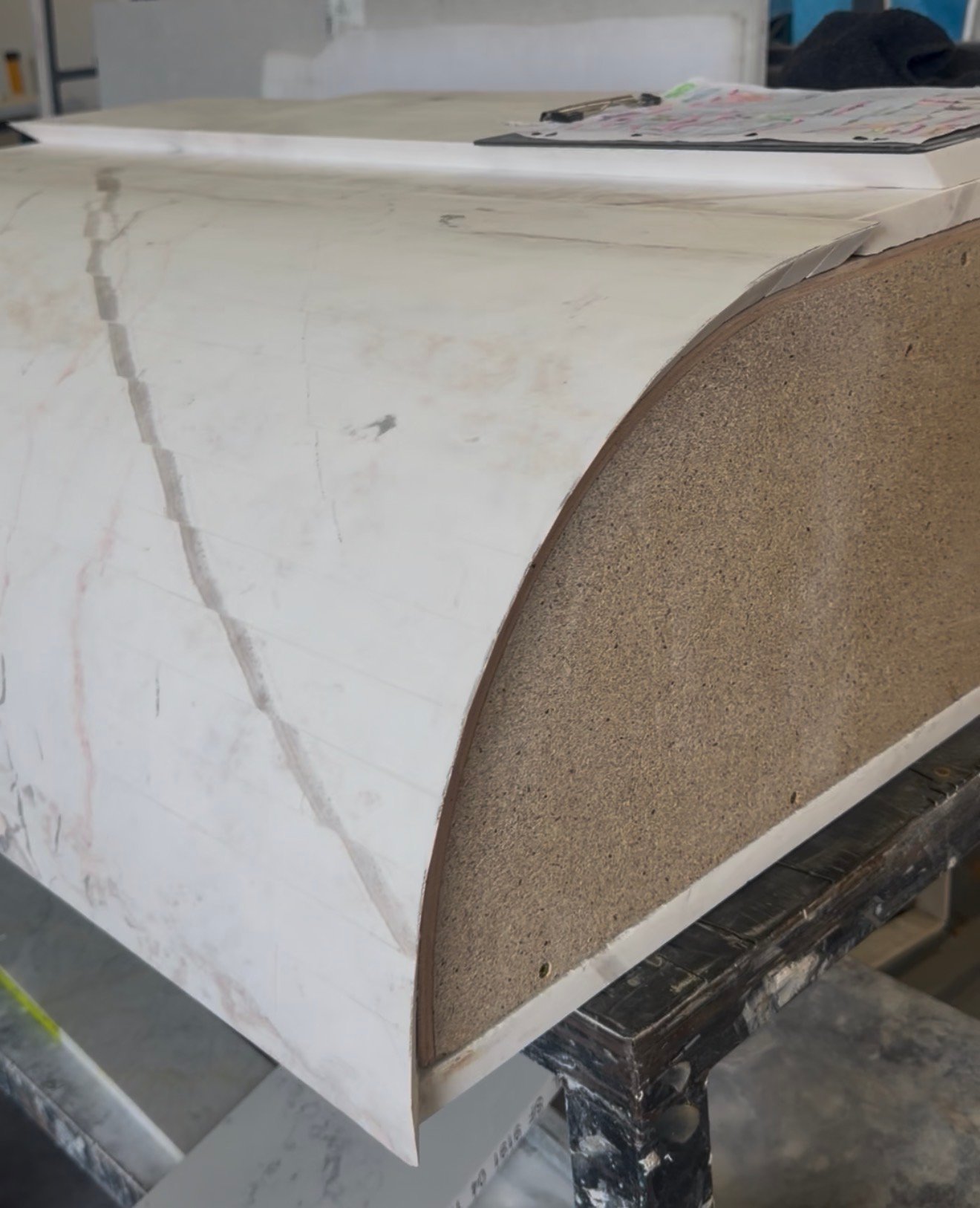 Custom curved Pieris Dolomite island fabrication before installation