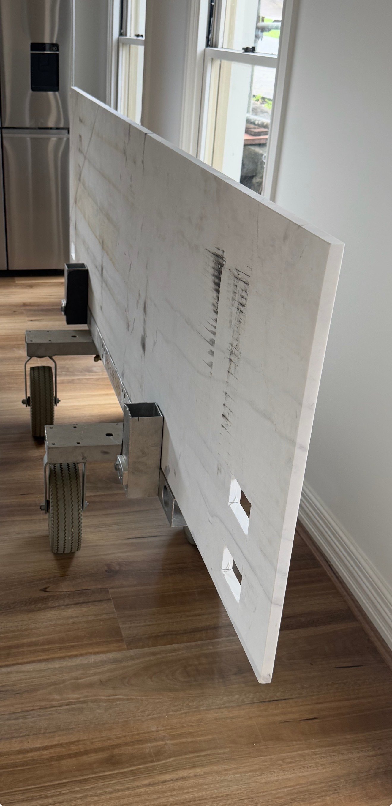 Large-format natural stone being transported with specialist stone handling equipment