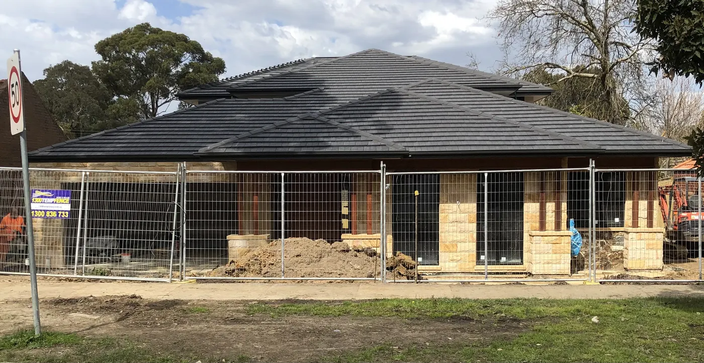 Residential rock-faced sandstone facade installation in Blackburn Victoria