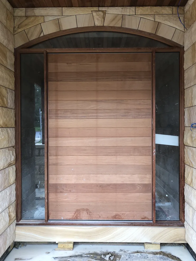 Detailed natural sandstone facade installation for private residence