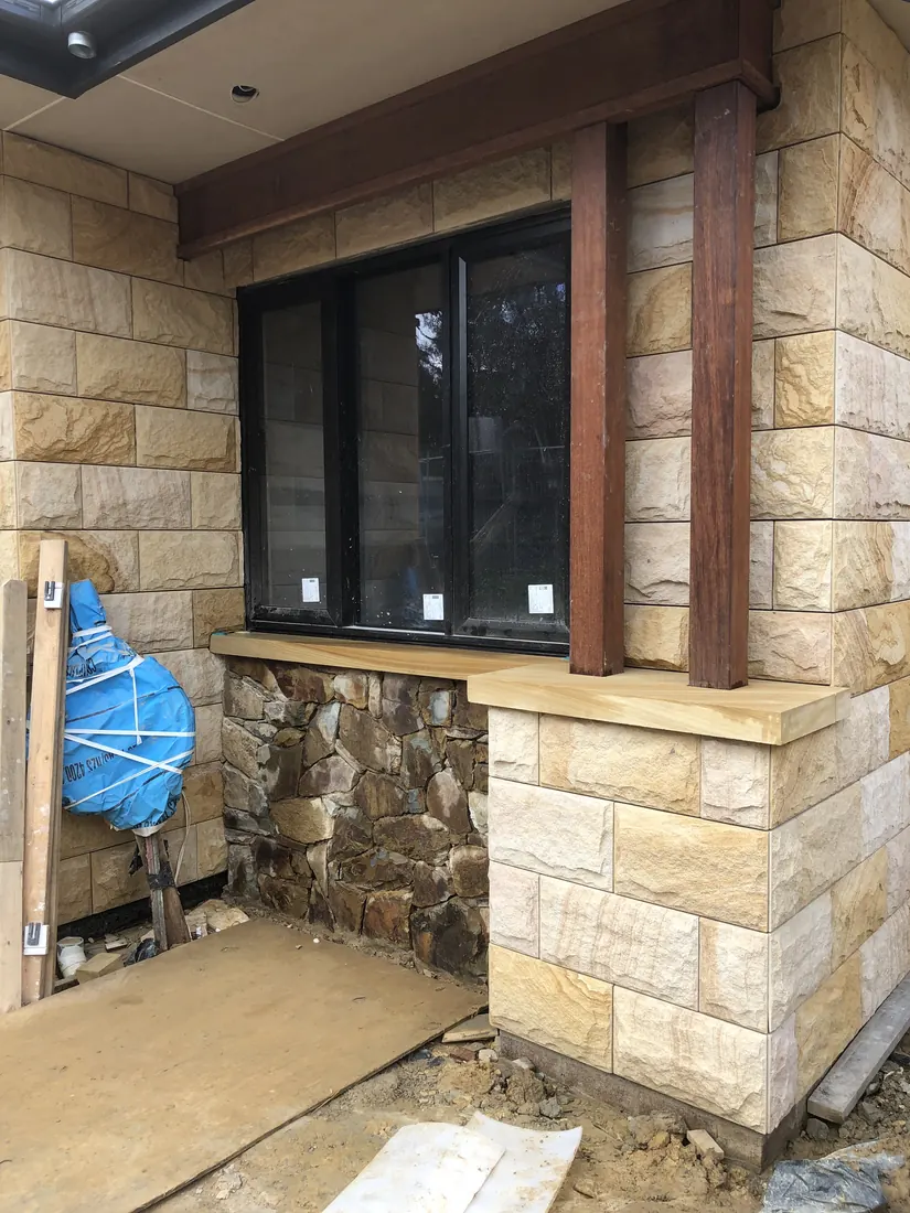 Sandstone facade work enhancing architectural character of home