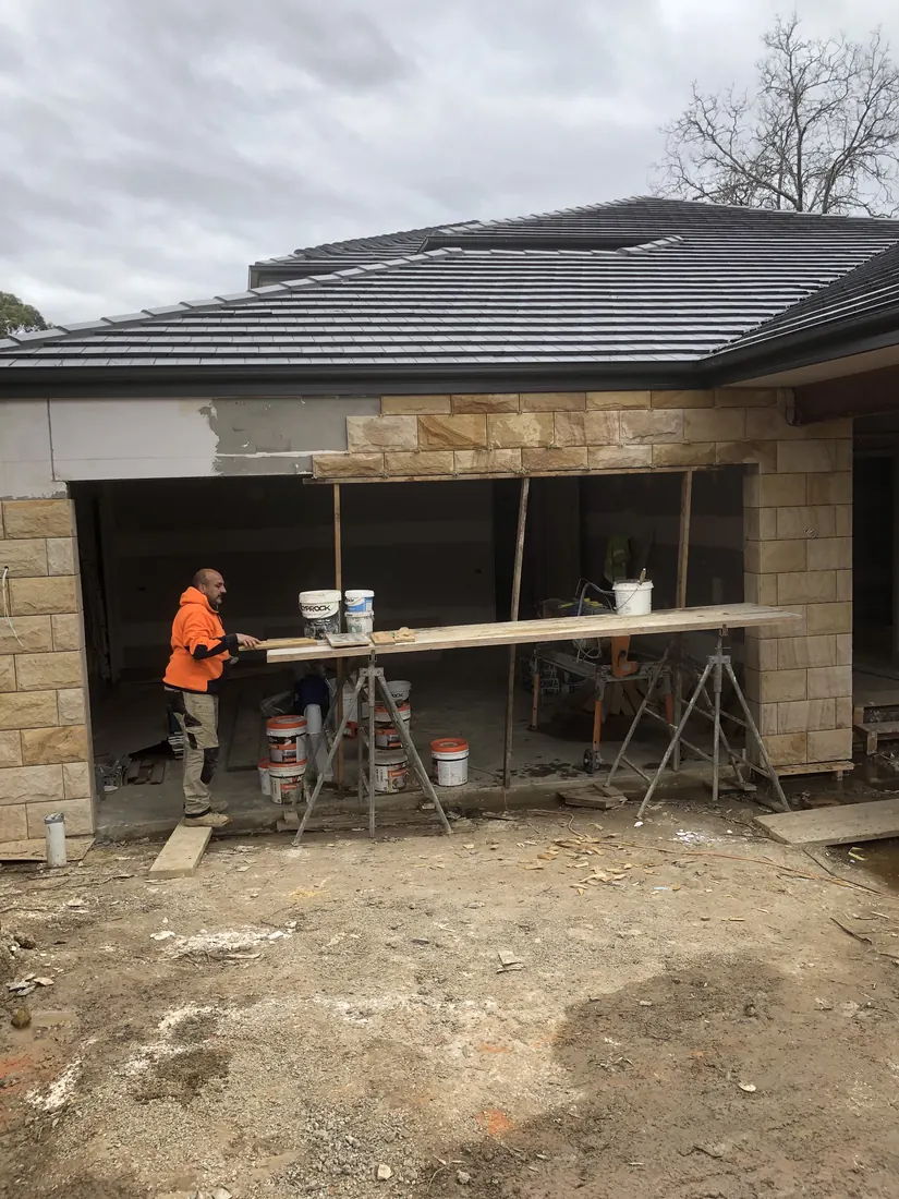 Durable sandstone cladding installed on residential exterior