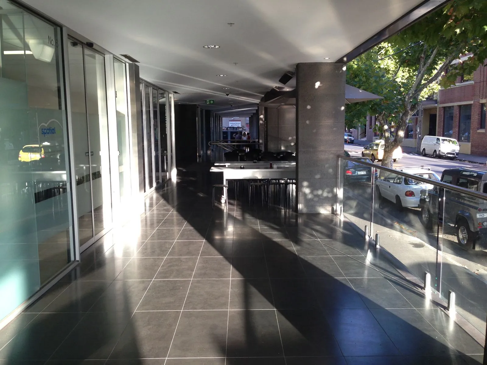 Exterior flamed granite panel cladding installed to commercial building facade in Collingwood, Victoria
