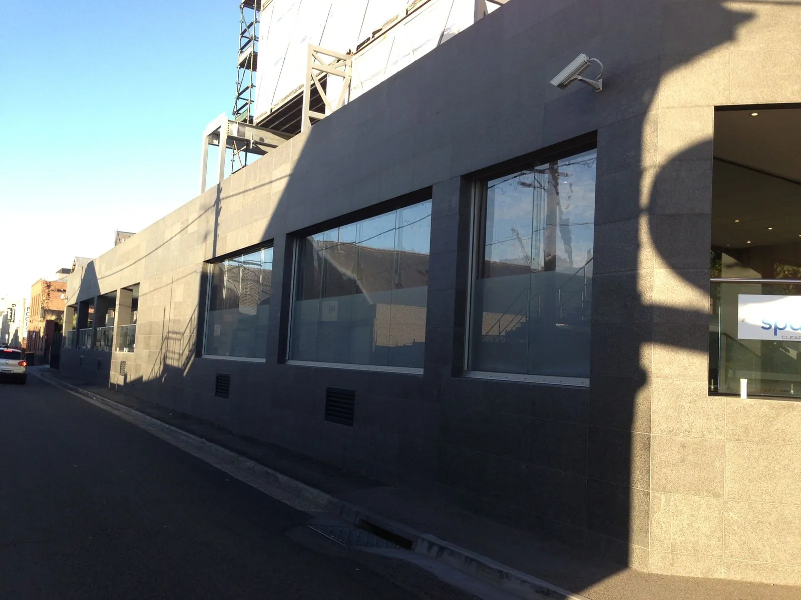 Granite panel cladding along the street-facing elevation of a commercial building in Collingwood