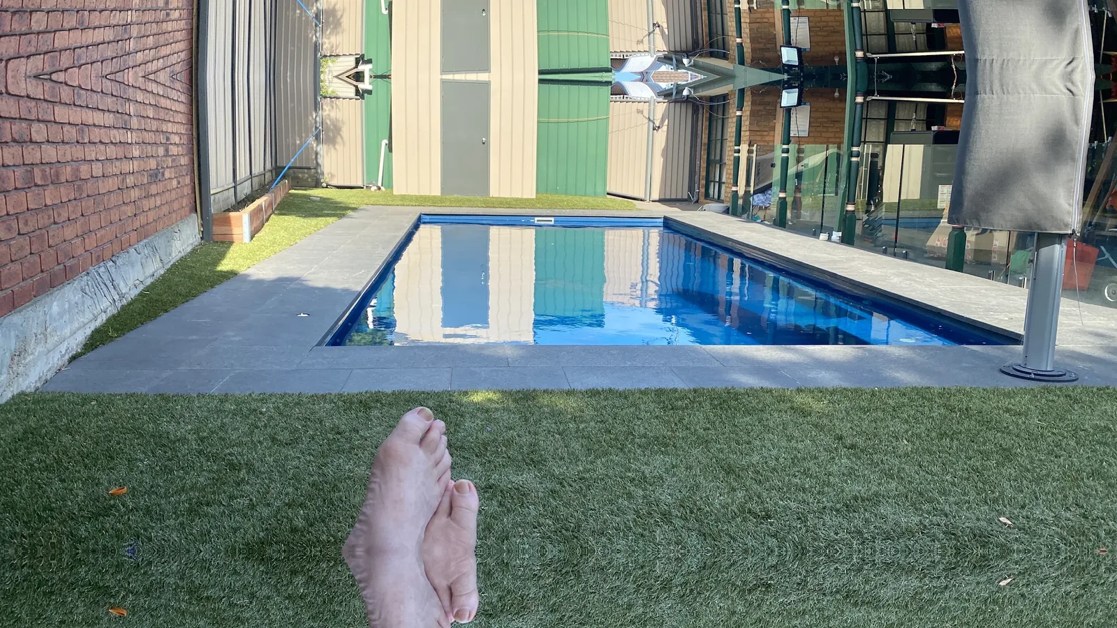 Finished swimming pool with granite coping installation in Hillside, Victoria