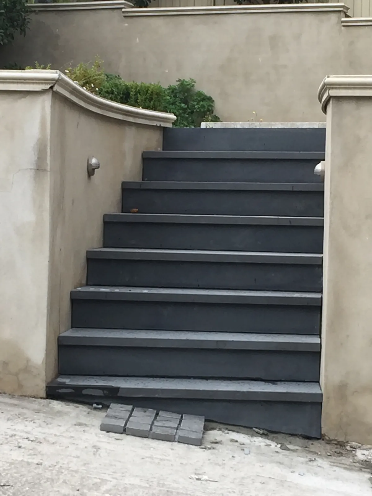 Finished bluestone stair treads and risers installed on the exterior staircase