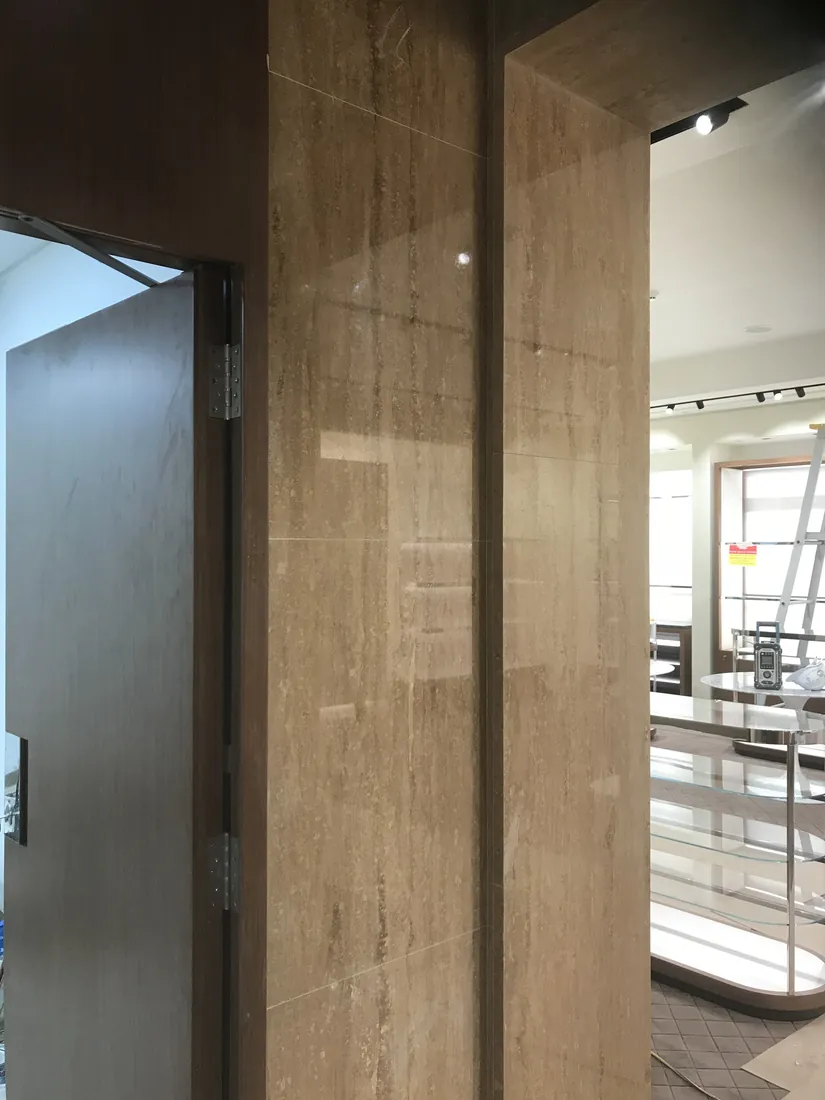 Luxury fashion boutique stone installation at Melbourne International Airport