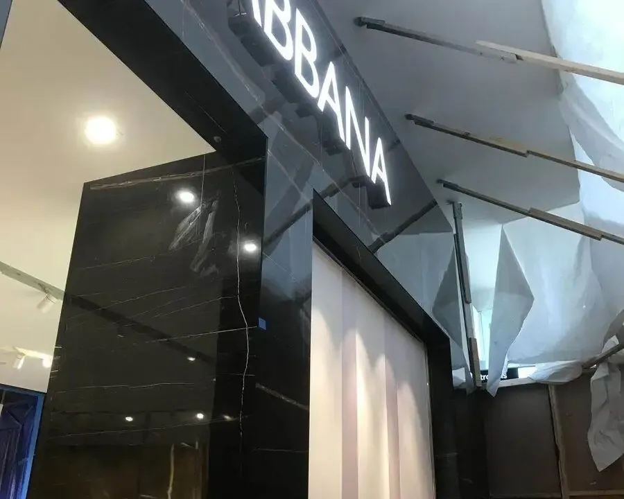 Professional tilers installing porcelain tiles