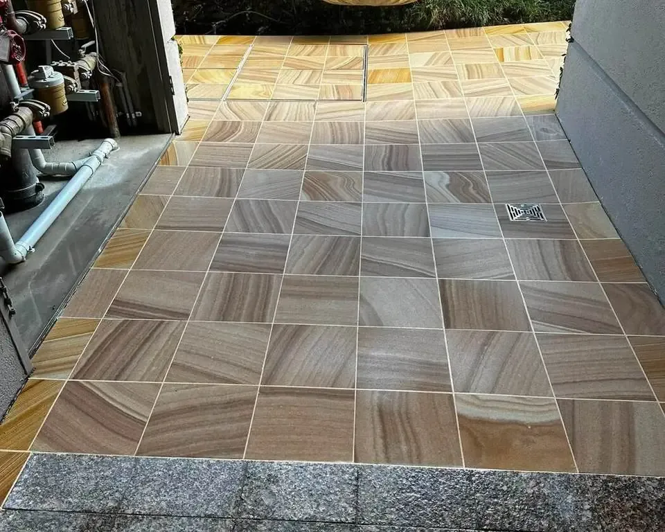 Sandstone garden walkway tiling installation, Melbourne