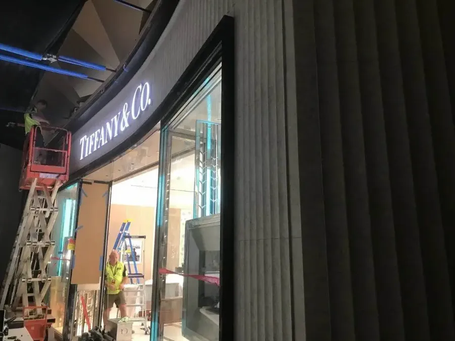 Fluted stone column cladding installation, retail fit-out, Melbourne