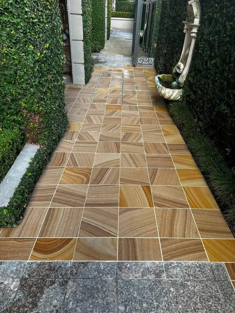 Sandstone paved garden walkway installation, Melbourne