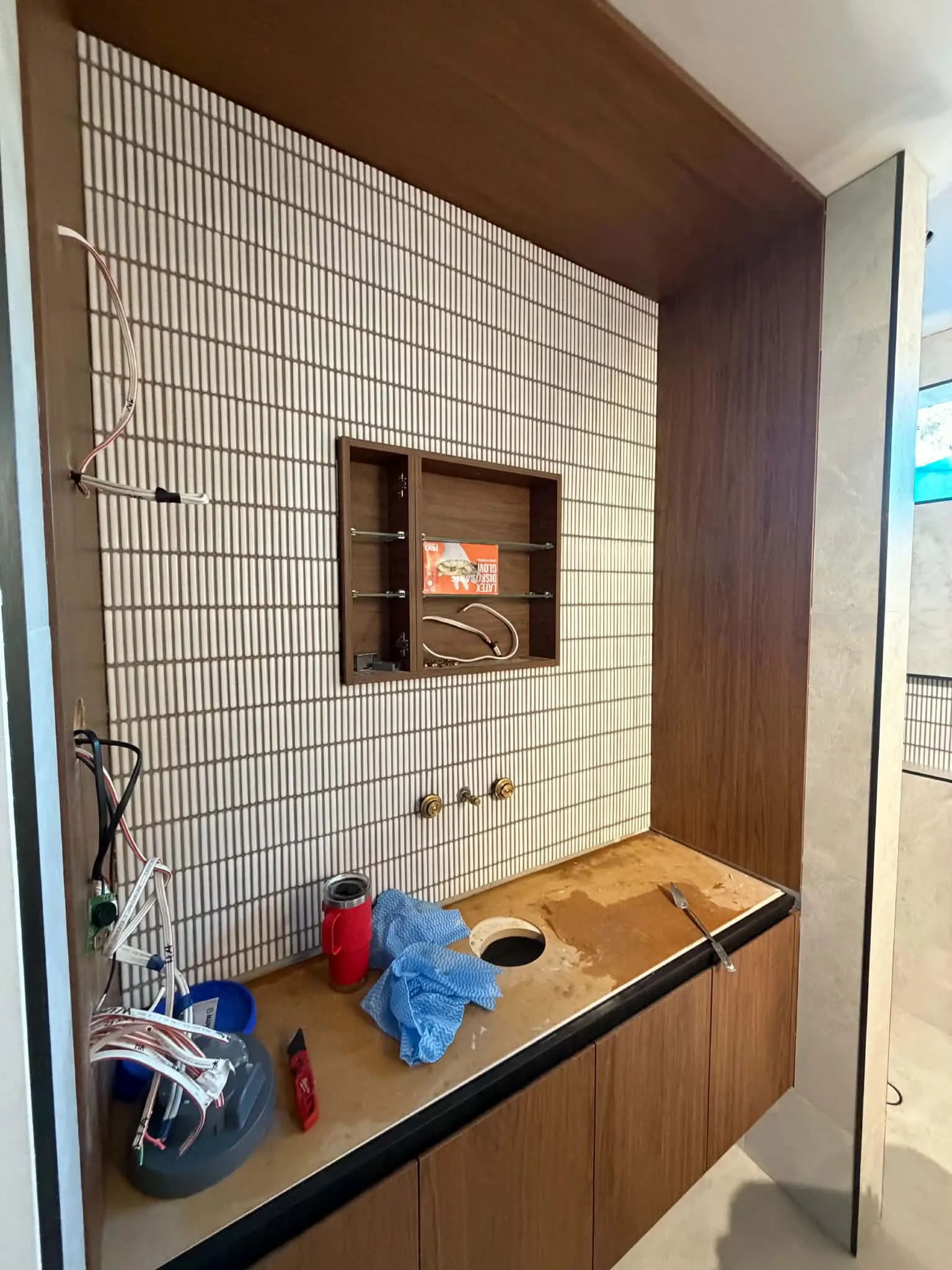 Completed vanity tiling with feature niche in Mitcham bathroom