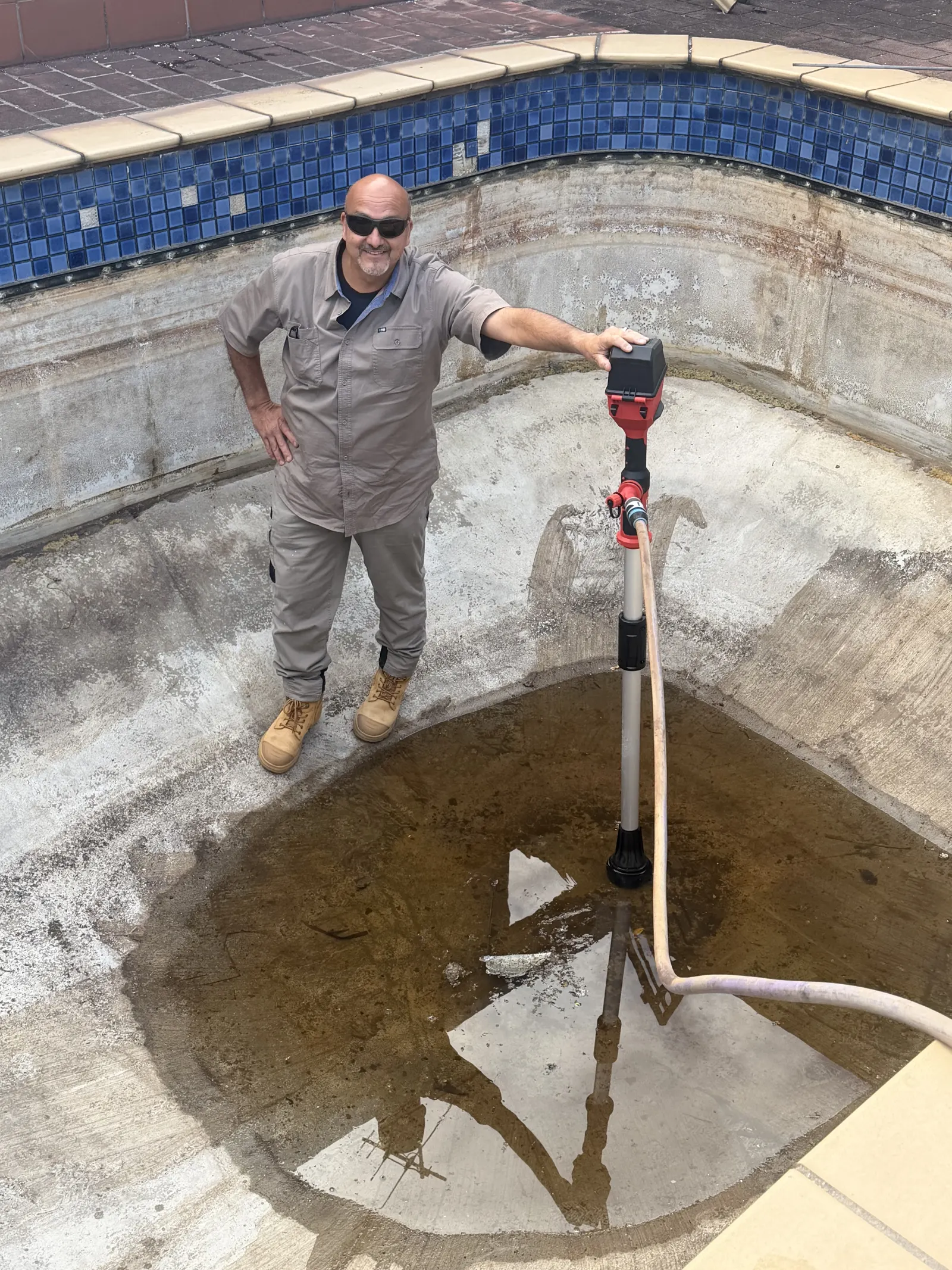 Pumping out stagnant water from Moorabbin pool before restoration