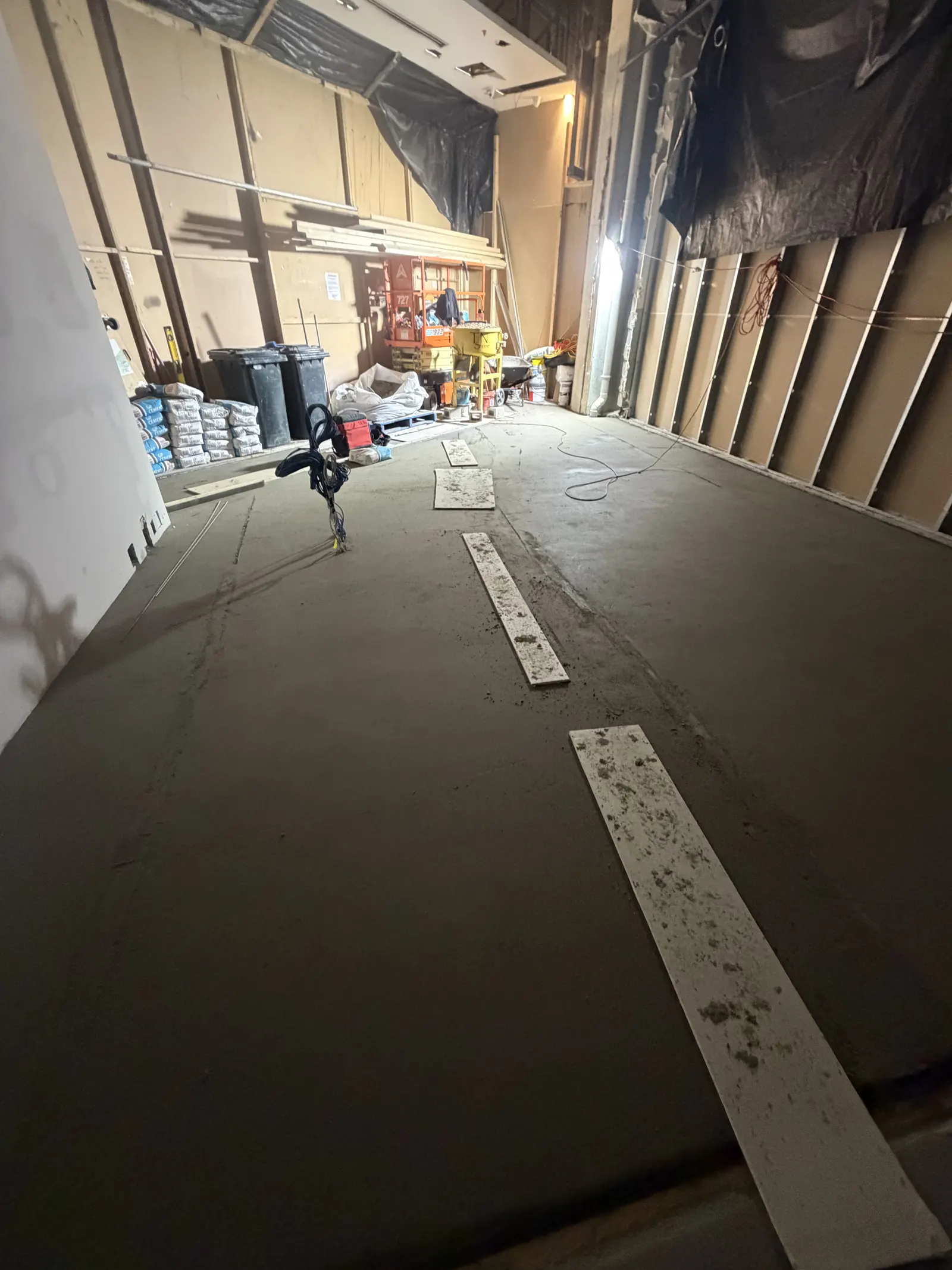 Concrete screed floor preparation before tiling at Scicluna's Tooronga