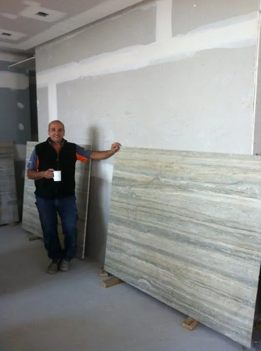 Travertine slab selection for a natural stone installation